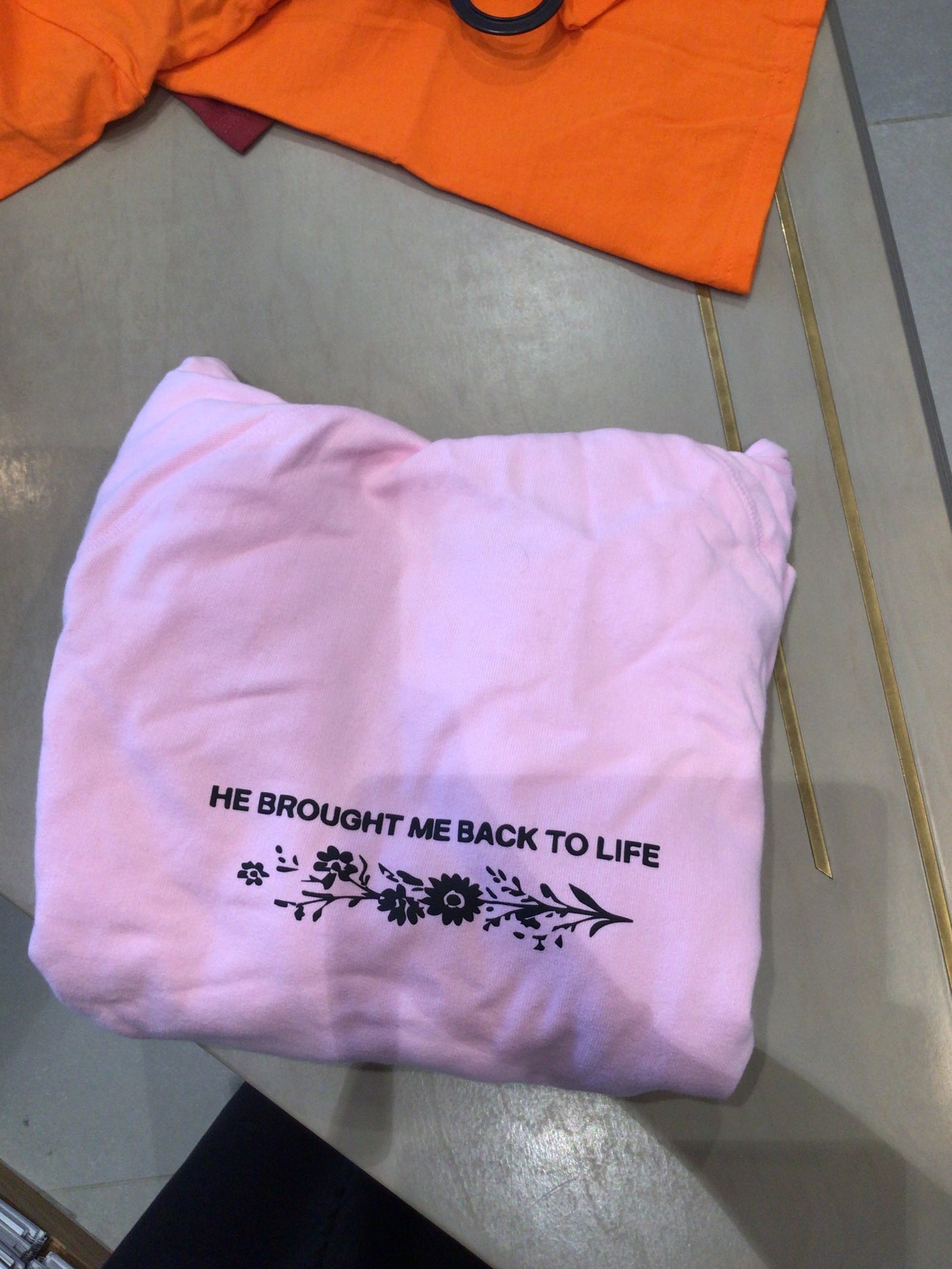 Pink hoodie “He brought me back to life”